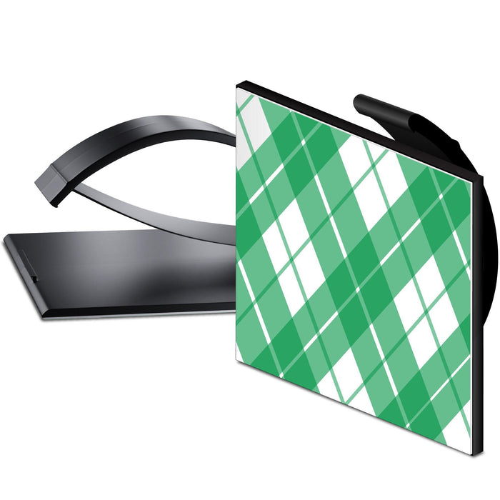 Adhesive cable clip, black strip with green patterned label holding cable