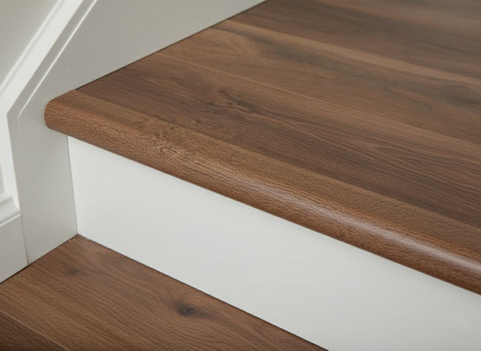 vinyl flooring installed on a stair case with closeup on stair nose