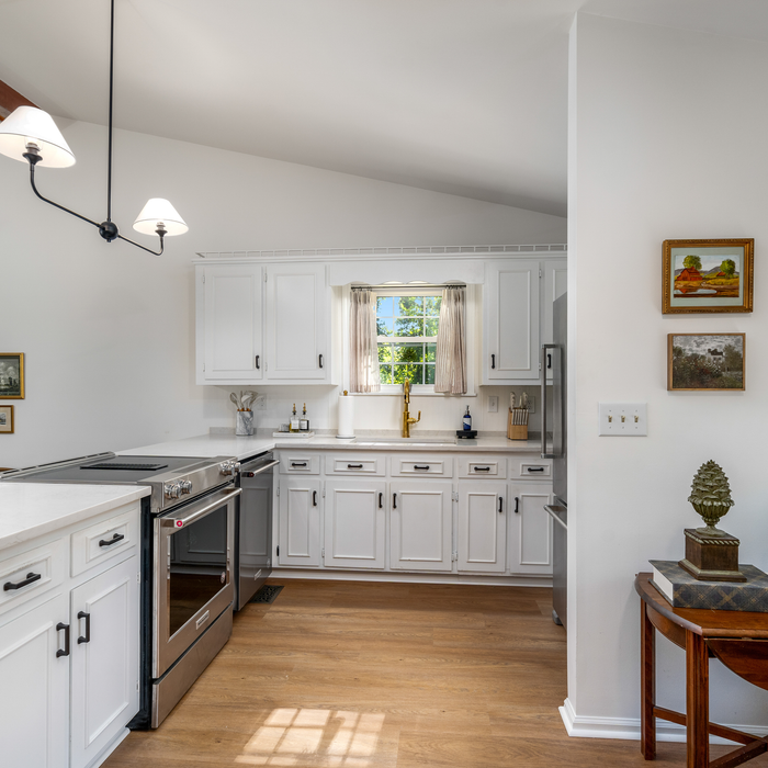 Allure Gingermisu Maple ISOCORE vinyl flooring installed in a open kitchen area