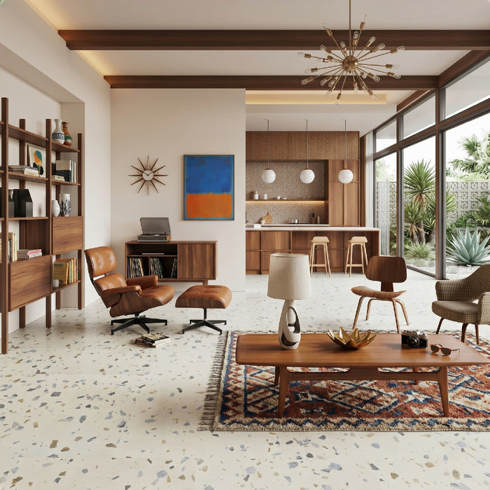 Modern living room with wooden furniture, a coffee table, and decorative elements.