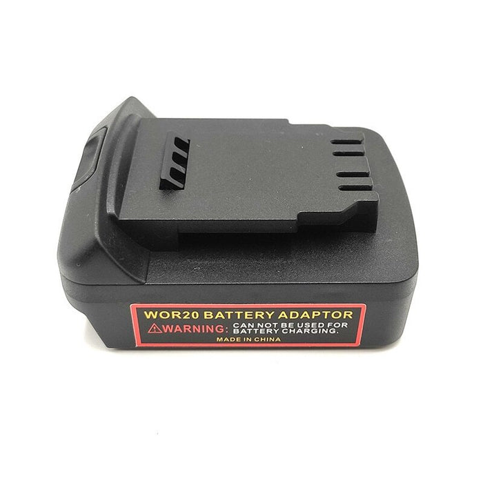 CAT 18V to DeWalt 20V MAX battery adapter - side view with the DeWalt tool-side connection above the warning label