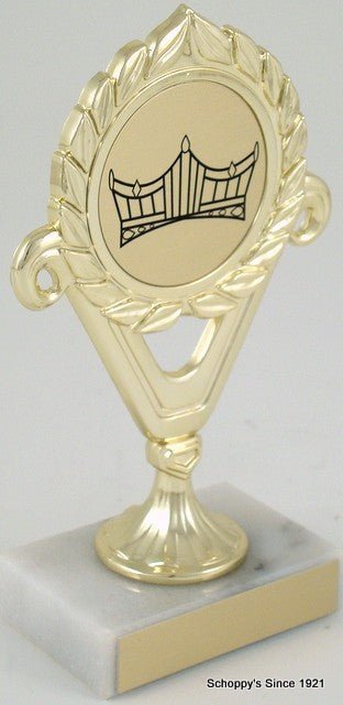 A trophy with a gold-colored cup and a crown logo in the center, mounted on a marble base.