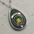 Dundas clan Scottish tartan necklace with clan crest and Essayez motto on tartan background