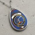Elliot clan Scottish tartan necklace with clan crest and Fortiter et Recte motto on tartan background