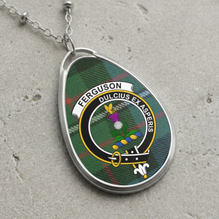 Ferguson clan Scottish tartan necklace with clan crest and Dulcius Ex Asperis motto on tartan background