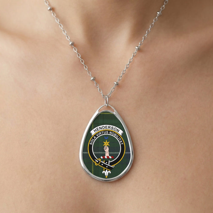 Close-up of Henderson clan tartan pendant necklace with crest design