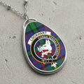 Lockhart clan Scottish tartan necklace with clan crest on tartan background