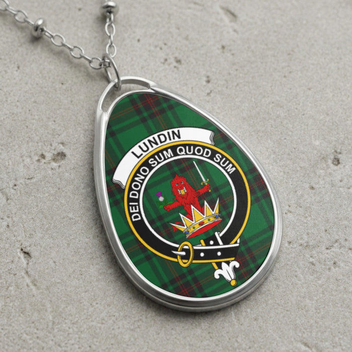 Lundin clan Scottish tartan necklace with clan crest and Dei Dono Sum Quod Sum motto on tartan background