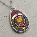 Lyle clan Scottish tartan necklace with clan crest and An I May motto on tartan background