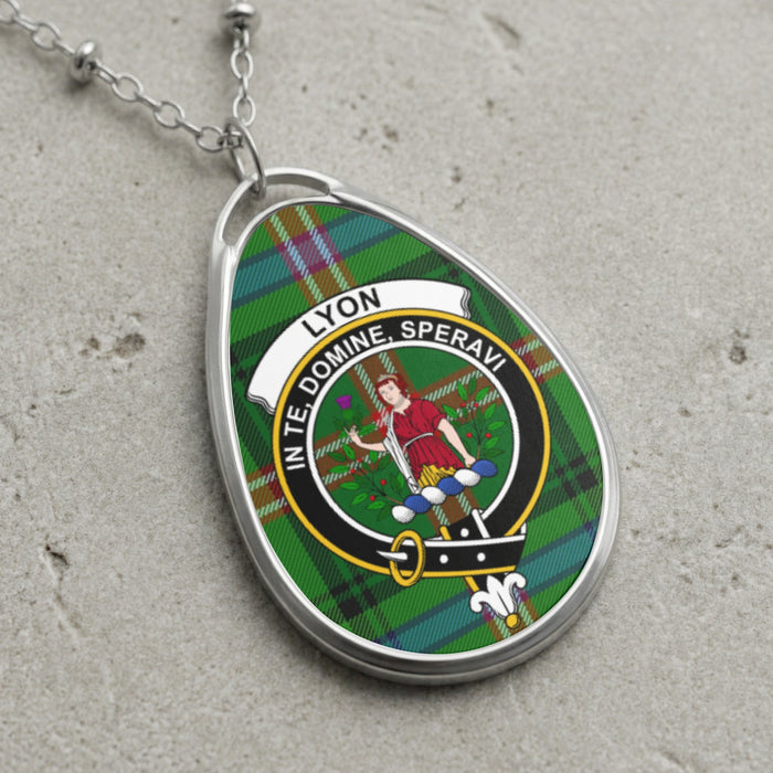 Lyon clan Scottish tartan necklace with clan crest and In Te Domine Speravi motto on tartan background
