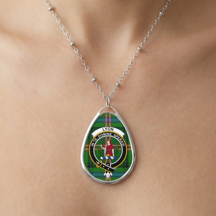 Close-up of Lyon clan tartan pendant necklace with crest design