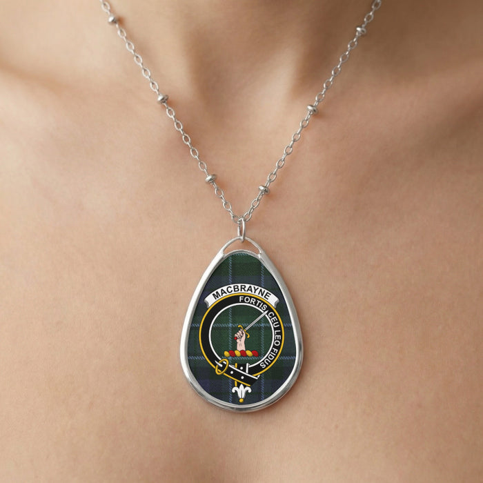 Close-up of MacBrayne clan tartan pendant necklace with crest design