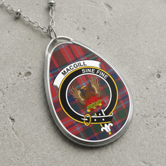 MacGill clan Scottish tartan necklace with clan crest and Sine Fine motto on tartan background