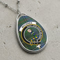MacInnes clan Scottish tartan necklace with clan crest and By God and the King motto on tartan background