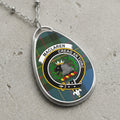 MacLaren clan Scottish tartan necklace with clan crest and Creag an Tuirc slogan on tartan background