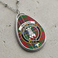 Maclean clan Scottish tartan necklace with clan crest and Virtue Mine Honour motto on tartan background