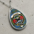 MacLeod clan Scottish tartan necklace with clan crest and Hold Fast motto on tartan background