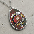 Macnab clan Scottish tartan necklace with clan crest and Timor Omnis Abesto motto on tartan background