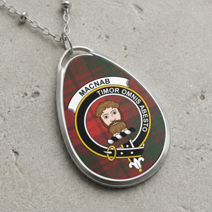 Macnab clan Scottish tartan necklace with clan crest and Timor Omnis Abesto motto on tartan background