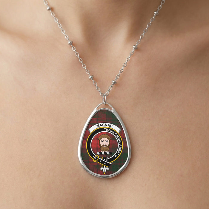Close-up of Macnab clan tartan pendant necklace with crest design