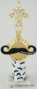 A trophy featuring a gold-colored male statue on a gold base with a large black mustache