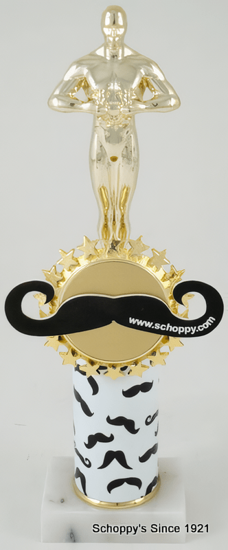 A trophy featuring a gold-colored male statue on a gold base with a large black mustache