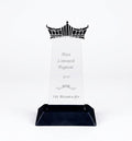 Acrylic award plaque on black base, featuring a crown design (AI Generated)