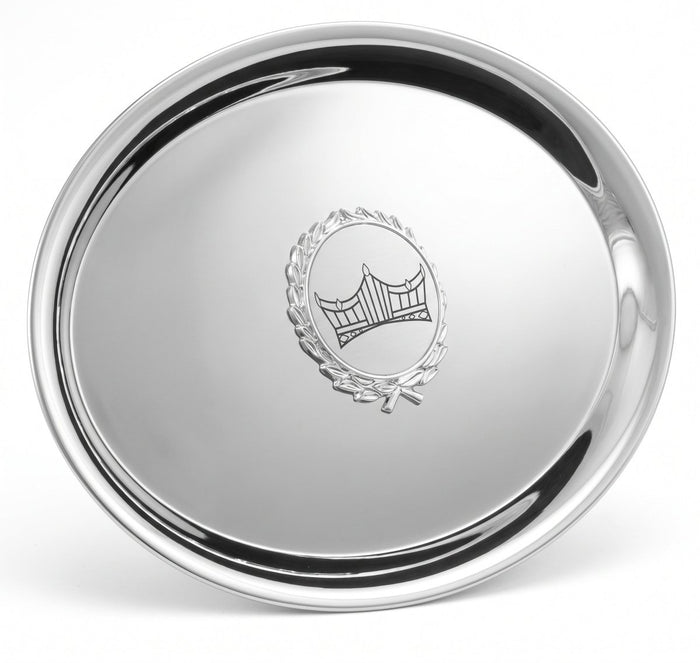A nickel plated, oval-shaped tray with the Schoppy's Crown Logo engraved in the center on a white background