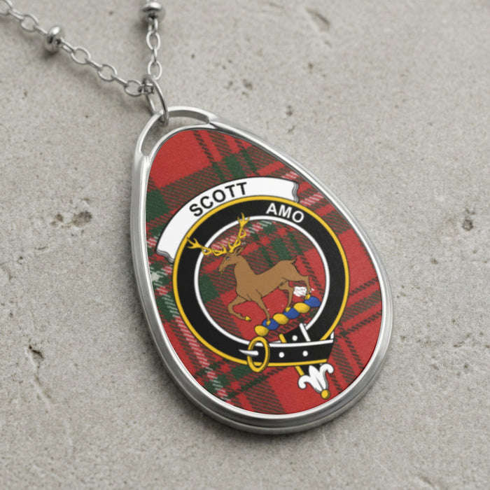 Scott clan Scottish tartan necklace with clan crest and Amo motto on tartan background