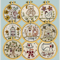 A set of 10 different stitching patterns for mini hoops, featuring various designs including a house, an owl, a cat, a bird, and a Christmas tree.